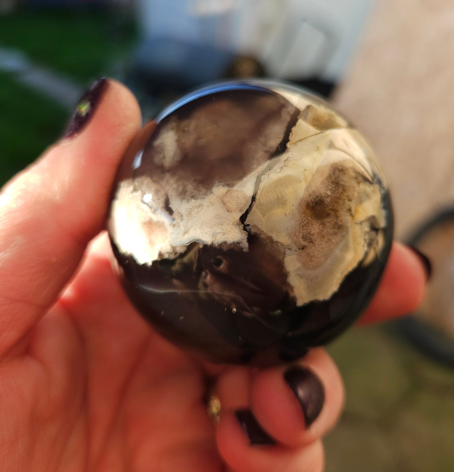 Black flower agate sphere