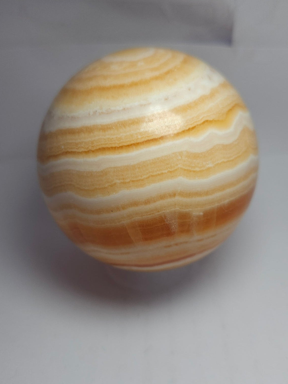 Orange calcite sphere