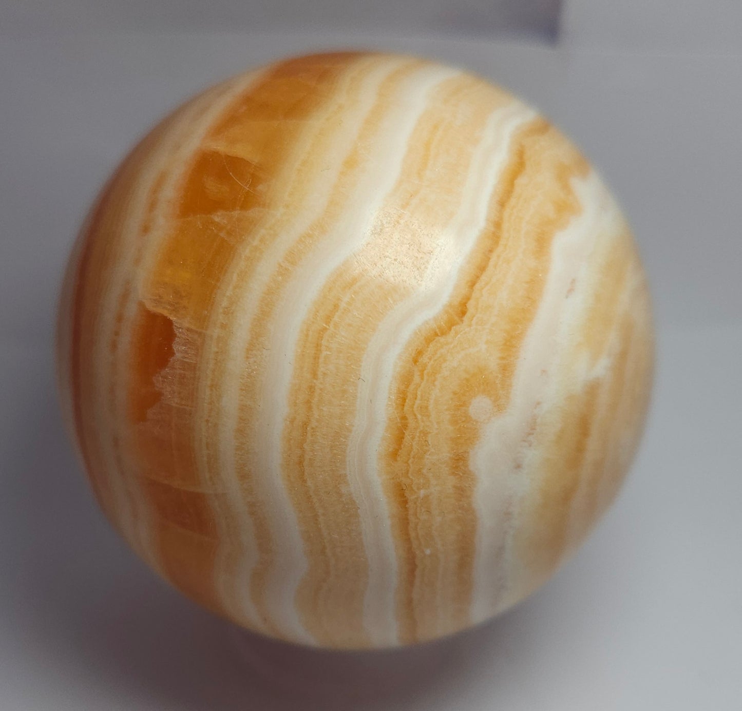 Orange calcite sphere