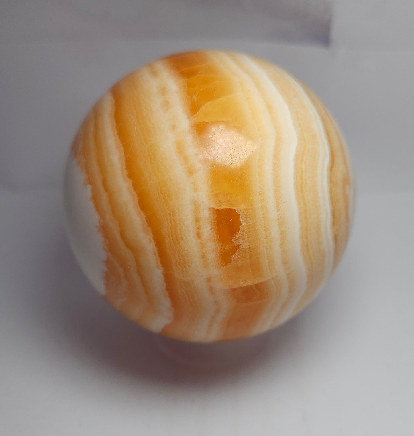 Orange calcite sphere